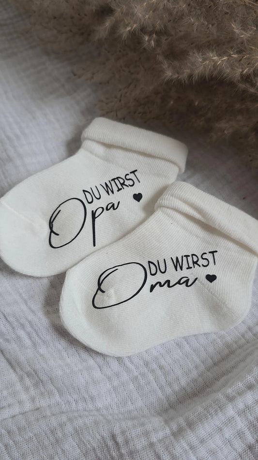 Babysöckchen zur Schwangerschaftsverkündung