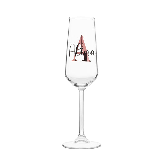 Sektglas mit Buchstaben und Namen